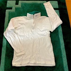 Descente White 100% Fine Cotton Jersey, made in Japan.  Polyester zip up collar.